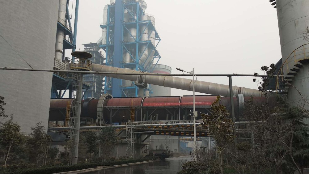 華東工控丨豫龍同力水泥礦石長(zhǎng)距離輸送膠帶輸送機(jī)多傳同步控制柜案例